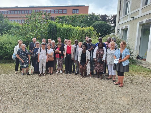 Photo de groupe avec les membres de la Commission de solidarité internationale